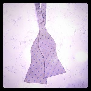 Gray bow tie with blue pin dot